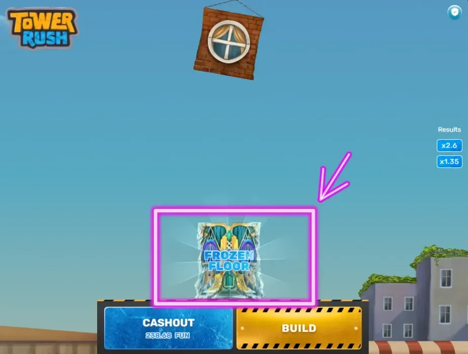 The Frozen Floor bonus locked into a Tower Rush tower above the Cashout and Build buttons